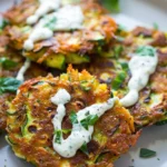 Crispy Zucchini Fritters With Herb Yogurt Sauce